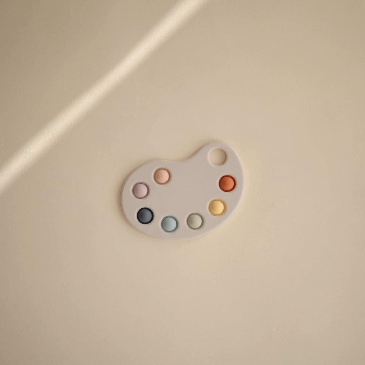 Mushie Paint Palette Press Toy